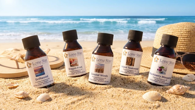 Fragrance oil sample bottles in warm sand